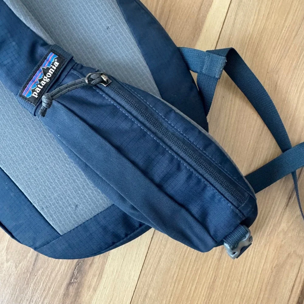 Patagonia Atom Sling 8L Backpack Sling Cross Body Bag Navy Blue Grey Orange Logo